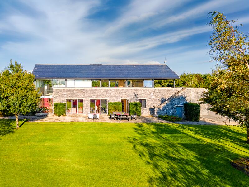The house is set over two floors and clad in stone