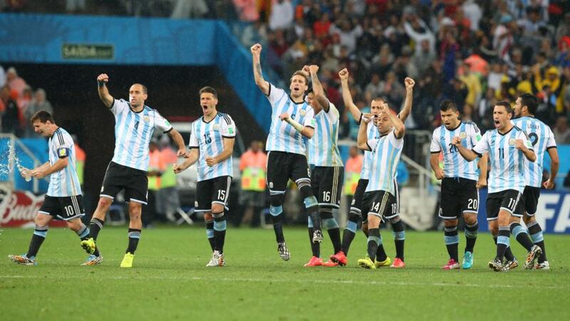 Argentina’s players celebrate during the penalty shootout against the Netherlands at the Corinthians Arena in Sao Paulo. Photograph: Srdhan Suki / EPA