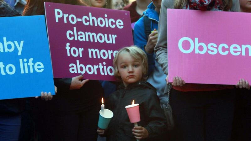 People attend the Pro-Life Campaign vigil outside Dail Eireann this evening. Photograph: Nick Bradshaw/The Irish Times