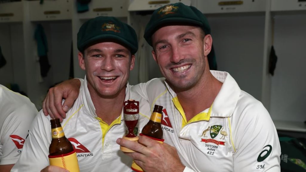 Peter Handscomb and Shaun Marsh of Australia celebrate after Australia regained the Ashes. Photo: Ryan Pierse/Getty Images