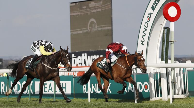 Tiger Roll (right) ridden by Davy Russell beats Pleasant Company and David Mullins in a photo-finish to win last year’s race. Photo : Tom Jenkins/Guardian