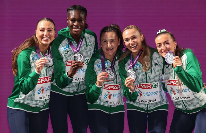 Sophie Becker, Rhasidat Adeleke, Phil Healy, Sharlene Mawdsley and Lauren Cadden celebrate with their silver medals. Photograph: Morgan Treacy