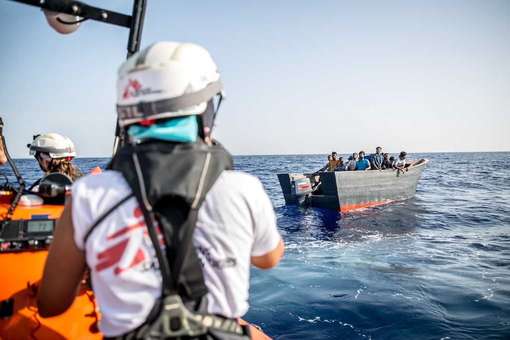 An MSF rescue crew comes across a boat that has left Libya in an attempt to reach Europe. Photograph: Sally Hayden
