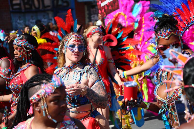 People taking part in the Notting Hill Carnival in London on Monday. Photograph: Alishia Abodunde/Getty Images