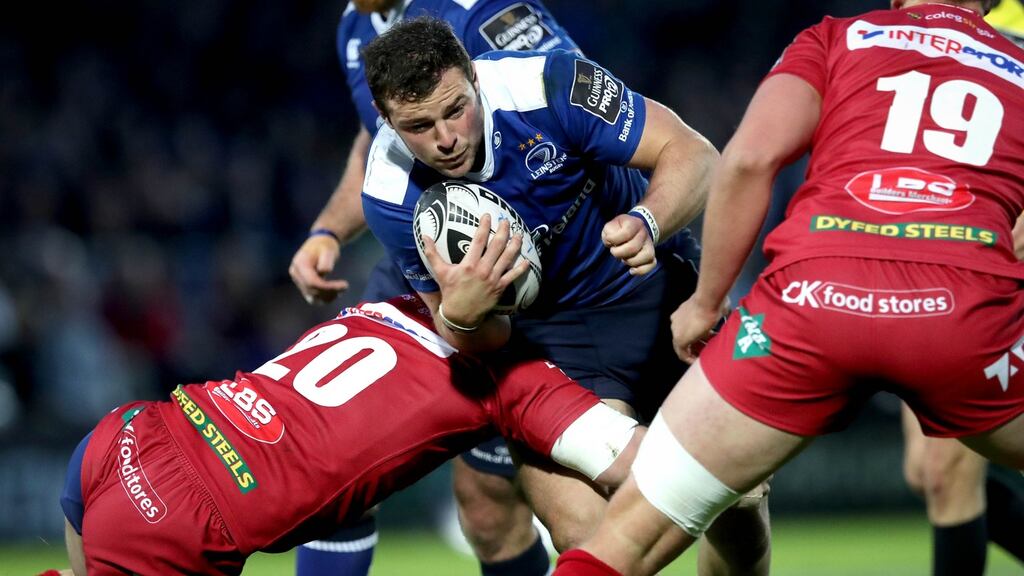 The Scarlets close down Leinster’s Robbie Henshaw in the Guinness Pro12 semi-final at the RDS. Photograph: Ryan Byrne/Inpho