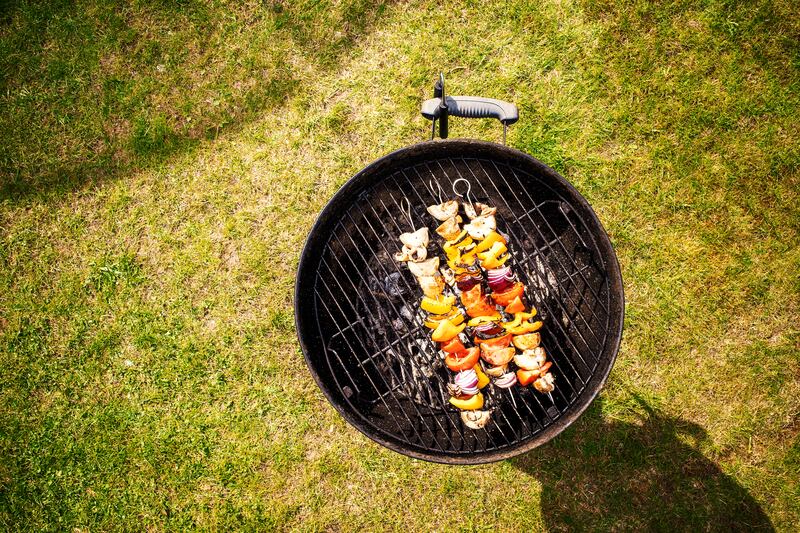 Above barbecue with vegetable kebabs. Use a meat thermometer to ensure all meat is cooked properly. Photograph: Sean Gladwell/Getty