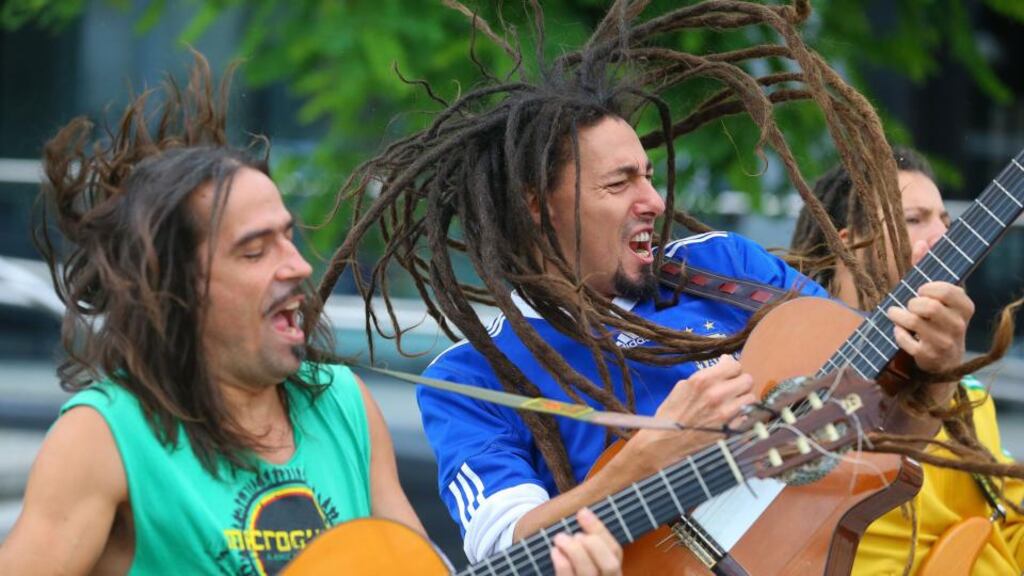 Mariano ‘Gaucho’ de Ritis from Argentina and Francesco ‘El Tano’ Casatta from Italy, of reggae band Microguagua, warm up for the Spraoi festival. Photograph: Patrick Browne