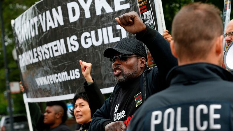 Protesters call for the conviction of police officer Jason Van Dyke outside the Leighton Criminal Court Building in Chicago. Photograph: Jim Young/AFP/Getty Images