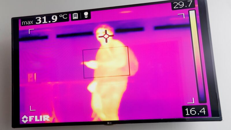 A person goes through the thermal scanner to rule out symptoms of coronavirus at the La Aurora airport in Guatemala City, Guatemala. Photograph: Esteban Biba/EPA