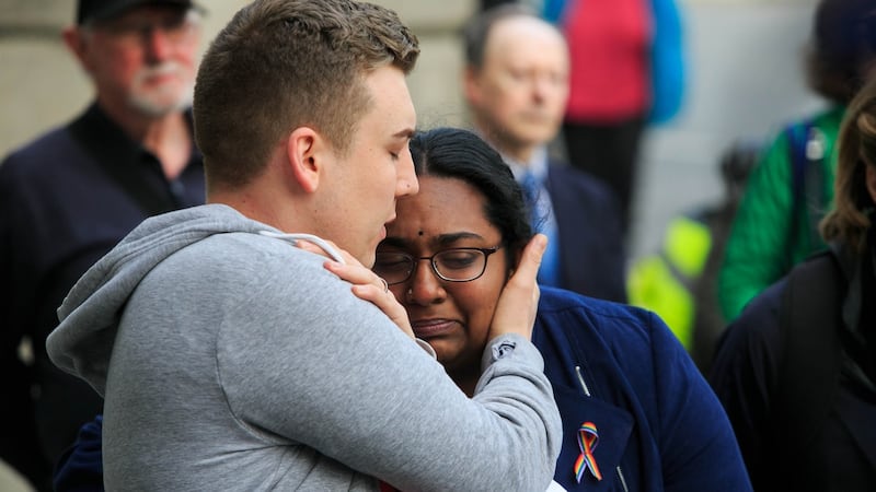 Jordan White and Hamsavani Rajeswaren both from Belfast during an NUJ vigil for Lyra McKee at the Garden of Remembrance, Parnell Square, Dublin.Photo: Gareth Chaney/Collins