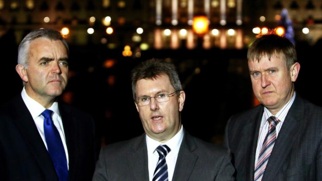 DUP representatives (left to right) Jonathan Bell, Jeffrey Donaldson and Mervyn Storey speaking to the media at Stormont House in Belfast on Thursday. Photograph: Brian Lawless/PA Wire