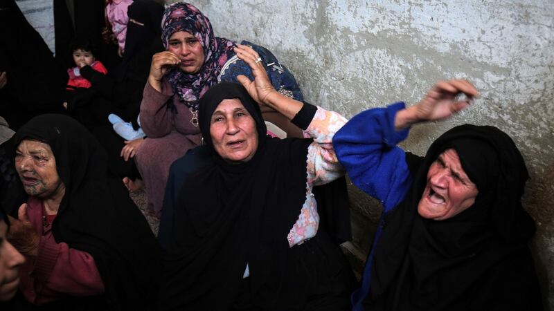Relatives of Alaa al-Zamili, a teenager who died the day before from wounds sustained in clashes with Israeli forces on the border with Israel, mourn during his funeral on Saturday. Photograph: Said Khatibsaid/AFP/Getty Images.