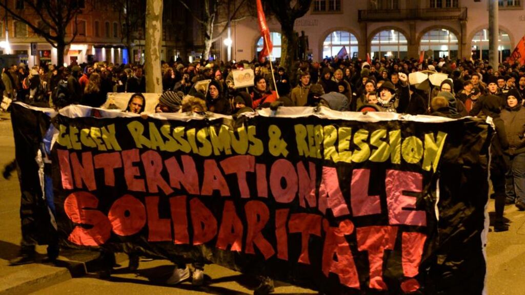 People demonstrate against the result of a national referendum in Zürichafter voters approve move to curb migration. Photograph: Steffen Schmidt/EPA