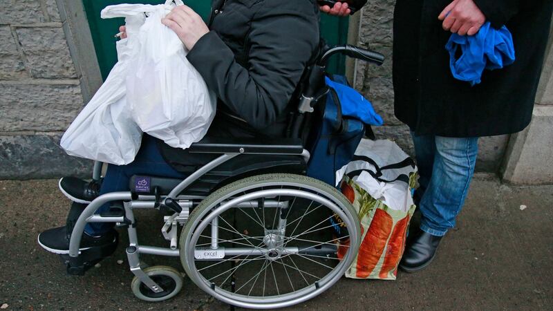 People at the Capuchin Day Centre on Dublin’s Bow Street on Friday.  Photograph Nick Bradshaw.