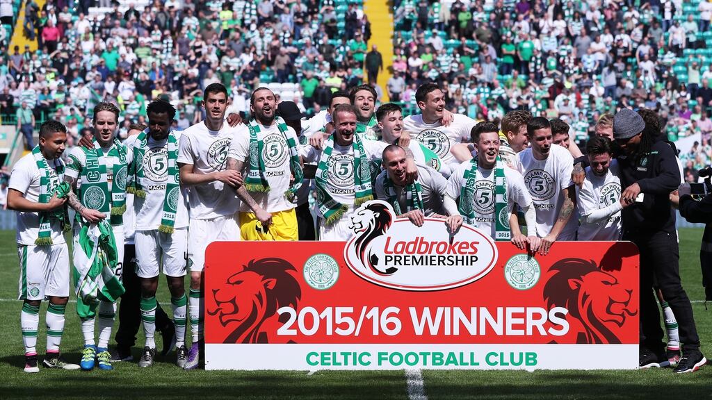 Celtic celebrate their fifth consecutive league title. Photograph: Getty