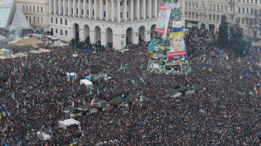 Hundreds of thousands of pro-European integration protesters at a rally in Kiev yesterday. As the events wound down last night, two days of tension in the capital were poised to end peacefully. Photograph: Konstantin Chernichkin/Reuters