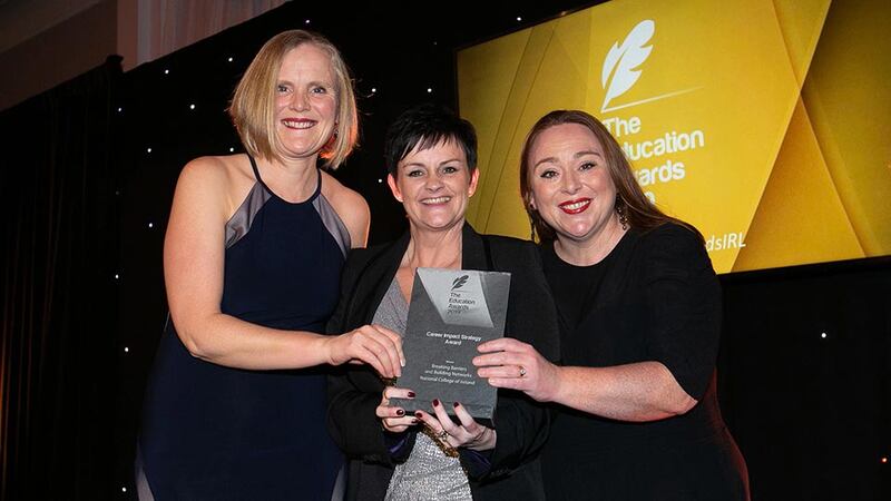 Lynn Willacy, Community and STEM Ambassador, Air Products Ireland presents the Career Impact Strategy Award to Caroline Kennedy and Dawn O’Connor, National College of Ireland