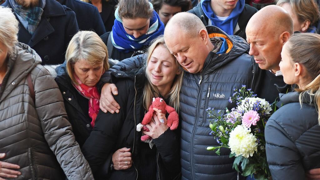 Leanne O’Brien, the girlfriend of Jack Merritt, is comforted by family members during a vigil at The Guildhall in Cambridge to honour him and Saskia Jones, both killed in Friday’s London Bridge attack. Photograph: Joe Giddens/PA