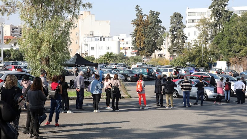 People queue to get the coronavirus Covid-19 Rapid Antigen tests in Nicosia, Cyprus. Photograph: Katia Christodoulou/EPA