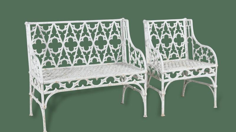 A Victorian Gothic-pattern garden seat and chair (€1,000-€1,500).