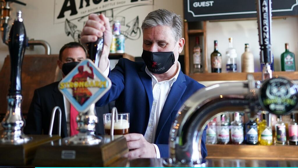 Labour Party leader Keir Starmer pulls a pint at Cameron’s brewery in Hartlepool. Photograph: Ian Forsyth/WPA Pool/Getty