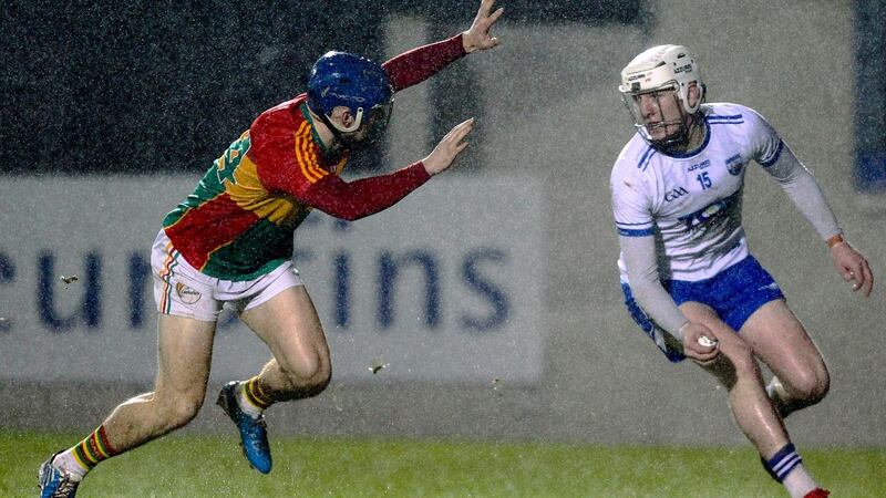 Waterford’s Shane Bennett and Carlow’s Michael Doyle in action during the Allianz Hurling League Division 1B game at Fraher Field. Photograph: Ken Sutton/Inpho