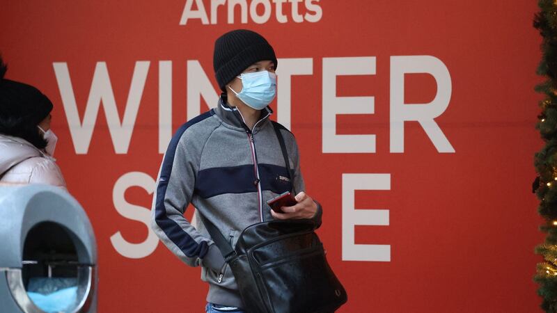 Masked and ready outside Arnotts ahead of opening.  Photograph: Nick Bradshaw/The Irish Times