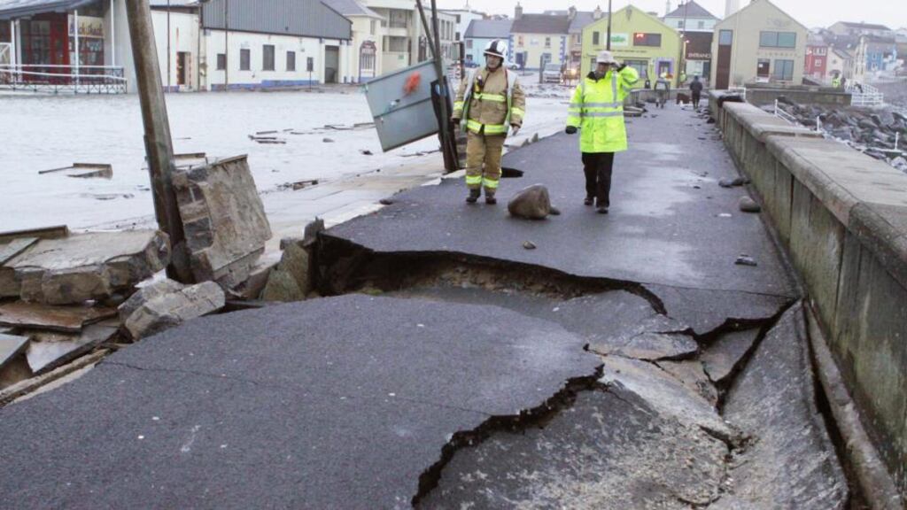 On the Clare coast waves tore pavements apart and hammered the Lahinch promenade. Photograph: Press 22