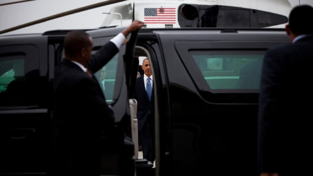 US president Barack Obama walks to his limousine in Los Angeles before traveling to a fundraiser at a private residence in Santa Monica on Friday. Mr Obama has defended government efforts to gather telephone and Internet data, and sought to reassure Americans that his administration was not listening in on their calls.  Photograph: Christopher Gregory/ The New York Times