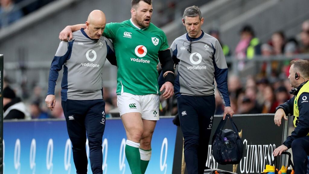 Ireland’s Cian Healy leaves the field injured during Saturday’s Six Nations loss to England. Photo: Billy Stickand/Inpho