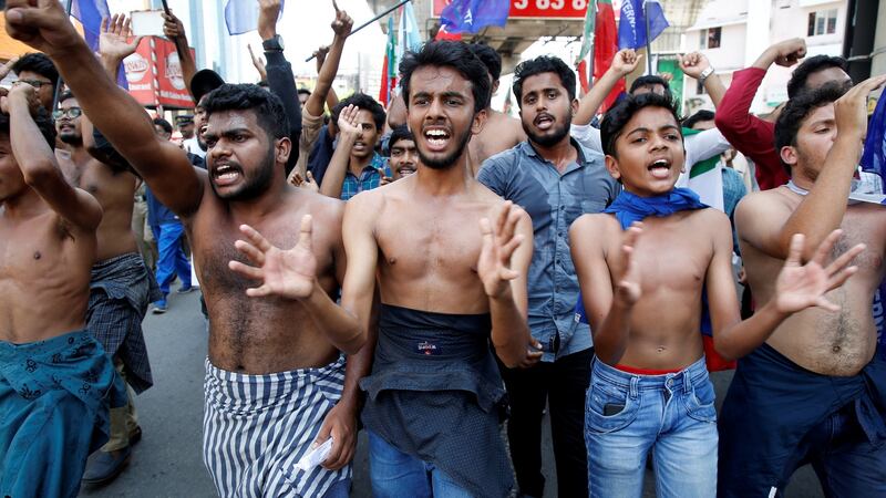 Demonstrators shout slogans during a protest march against the new citizenship law, in Kochi, India. Photograph: Sivaram V/Reuters