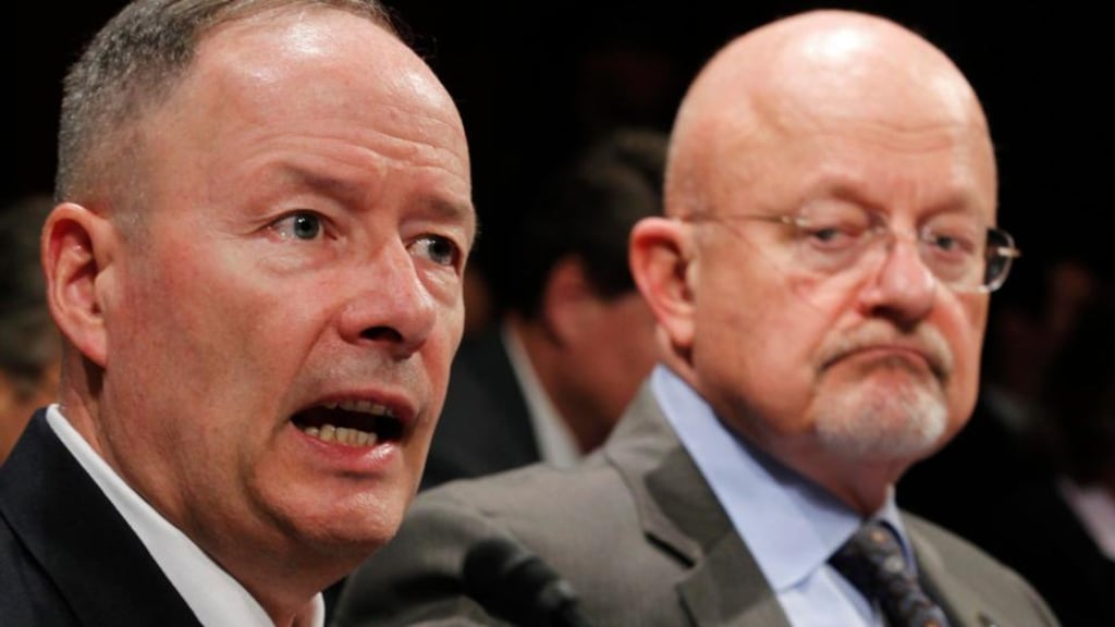 General Keith Alexander (L), director of the National Security Agency (NSA) testifies at a House Intelligence Committee hearing on Capitol Hill in Washington today. Director of National Intelligence James Clapper watches on. Photograph: Jason Reed/Reuters.