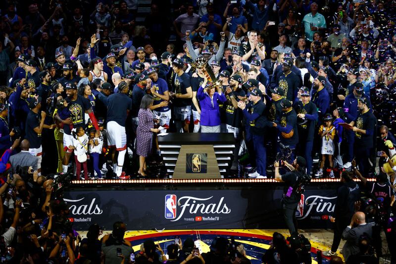Denver Nuggets owner Stan Kroenke raises the Larry O'Brien Championship Trophy after a 94-89 victory against the Miami Heat in Game Five of the 2023 NBA Finals to win the NBA Championship at Ball Arena in Denver, Colorado. Photograph: Justin Edmonds/Getty Images