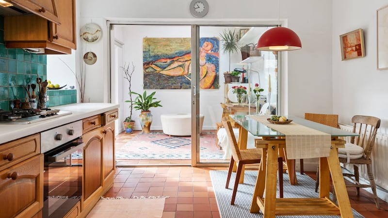 Kitchen leading to sunroom