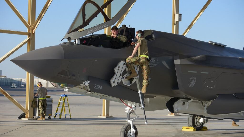 US soldiers beside an F-35A Lightning  fighter  jet stationed at the Emirati al-Dhafra base, 32  kilometres south of Abu Dhabi. Photograph: US Central Command/AFP via Getty Images