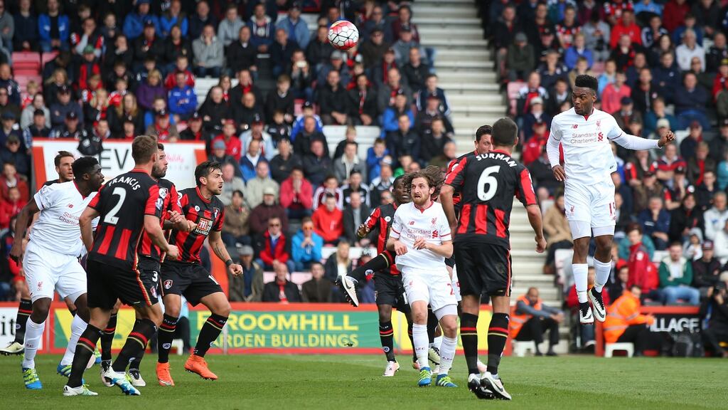 Daniel Sturridge leaps to score for Liverpool against Bournemouth. Photograph: Getty