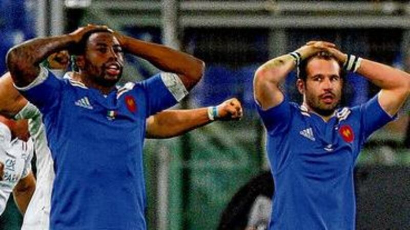 French players show their dejection following the defeat to Italy