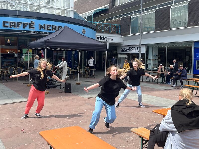 Local teenage girls dancing at Sunderland's food festival last week. Photograph: Mark Paul