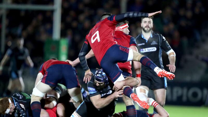 Munster’s Conor Murray is hit by Josh Strauss of Glasgow Warriors at Scotstoun. Photograph: Dan Sheridan/Inpho