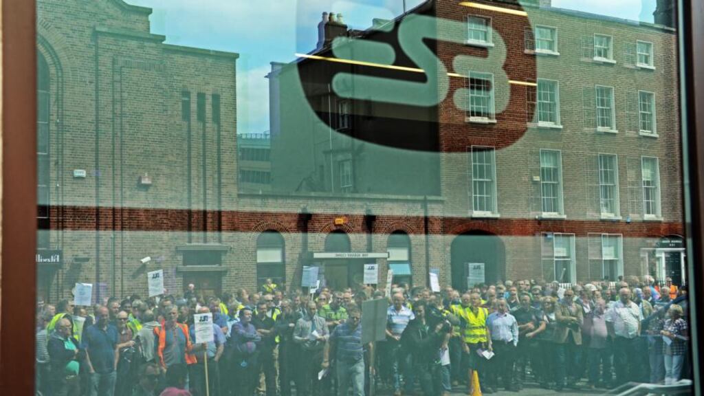 ESB unions plan to take the first step in balloting workers to strike over the €1.7 billion hole in the company’s pension plan next month. Last month workers held a meeting to voice concerns about their pensions, on the street outside the ESB Headquarters in Dublin, as the AGM took place inside. Photograph: Eric Luke