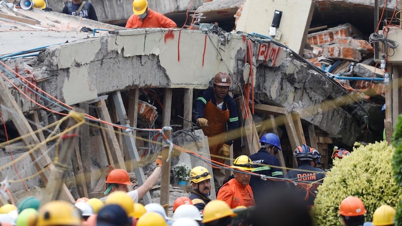 Rescue workers search through the rubble for students at Enrique Rebsamen school after an earthquake in Mexico City, Mexico. Photograph: Reuters/Edgard Garrido