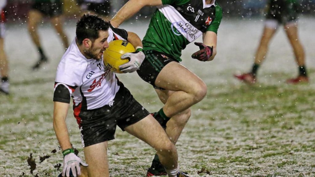 Queen’s University versus IT Sligo - Sligo’s Mark McHugh and Queens Ciaran O’Holland. Photograph: Matt Mackey/Inpho