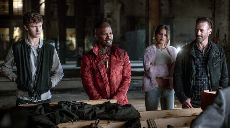 Ansel Elgort, Jamie Foxx, Eiza Gonzalez and Jon Hamm in a scene from ‘Baby Driver’