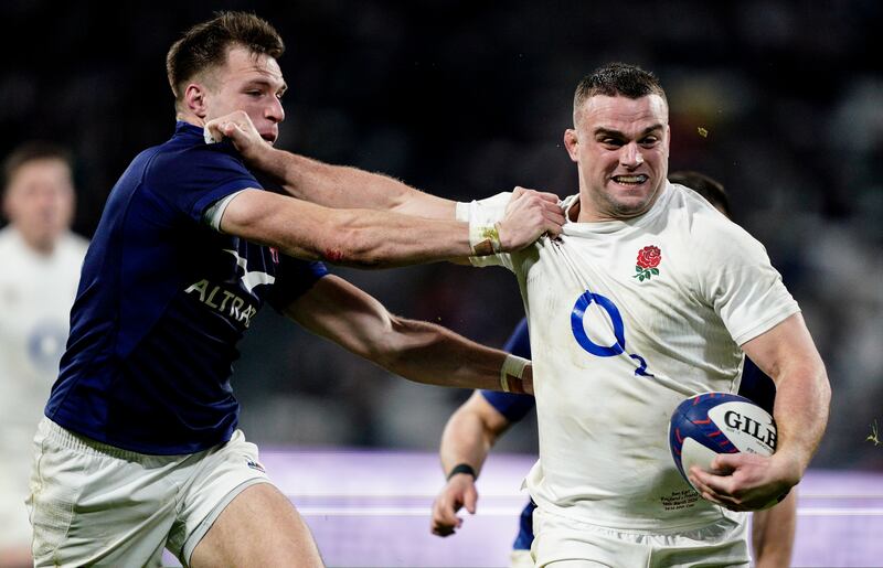 Ben Earl of England hands off Leo Barre of France. Photograph: Dave Winter/Inpho