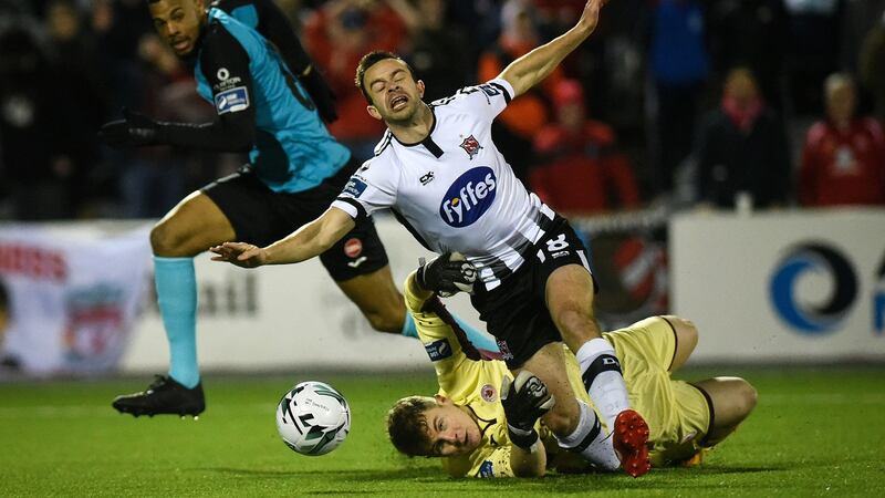 Robbie Benson is injured in the early stages of Dundalk’s draw with Sligo Rovers. Photograph: Ciaran Culligan/Inpho