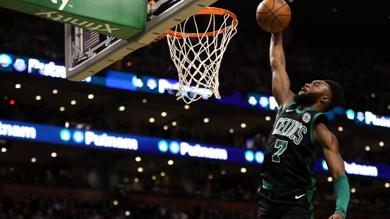 Jaylen Brown dunks during the first half against the Phoenix Suns. Photograph: Maddie Meyer/Getty Images