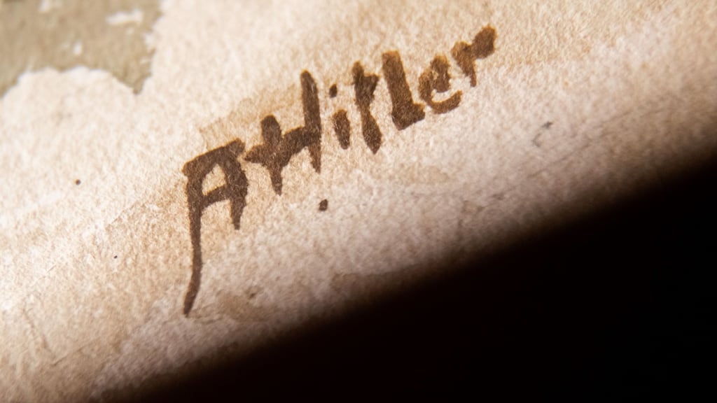 The signature ‘AHitler’ on a watercolour displayed at the Weidler auction house in Nuremberg. Photograph: Daniel Karmann/AFP/Getty Images
