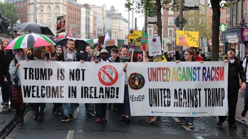 Anti-Trump demonstrators walk along O’Connell Street in Dublin. Photograph: Liam McBurney/PA Wire