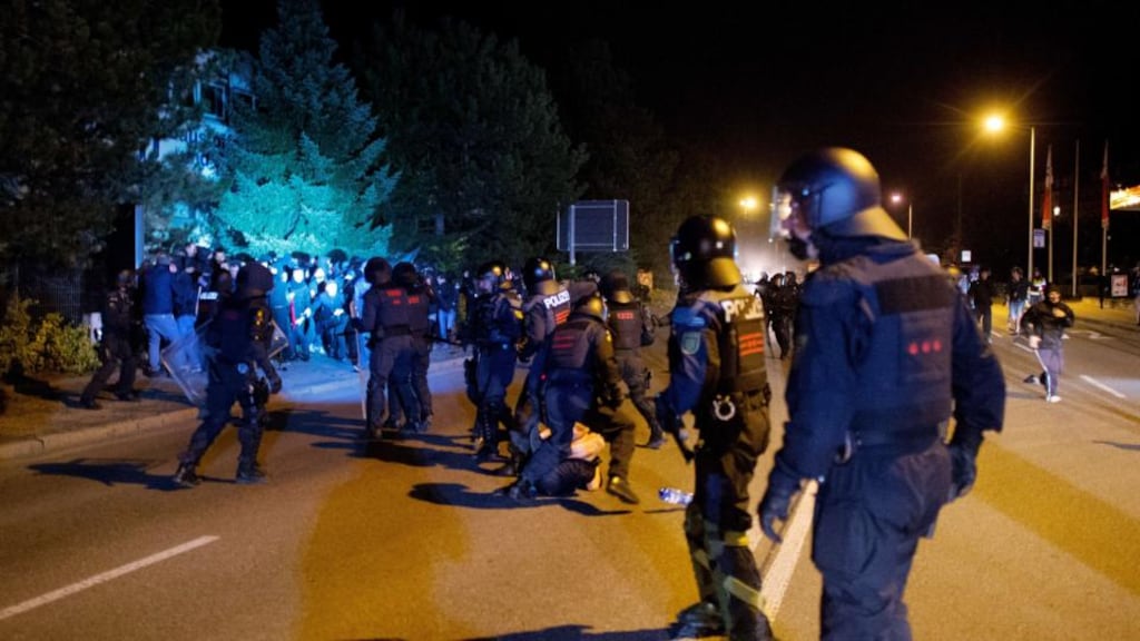 Police clash with opponents of refugee accommodation in a former hardware store in Heidenau, Germany on Sunday. Photograph: AFP/Getty Images
