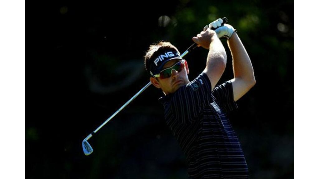 Louis Oosthuizen of South Africa tees off on the 18th hole during the third round of the Africa Open at East London Golf Club (Photograph: by Warren Little/Getty Images)
